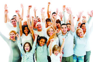 Large group of a happy people with raised hands.