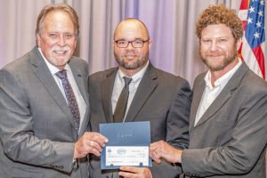 ICI check presentation for Builders Care at NEFBA Installation ceremony