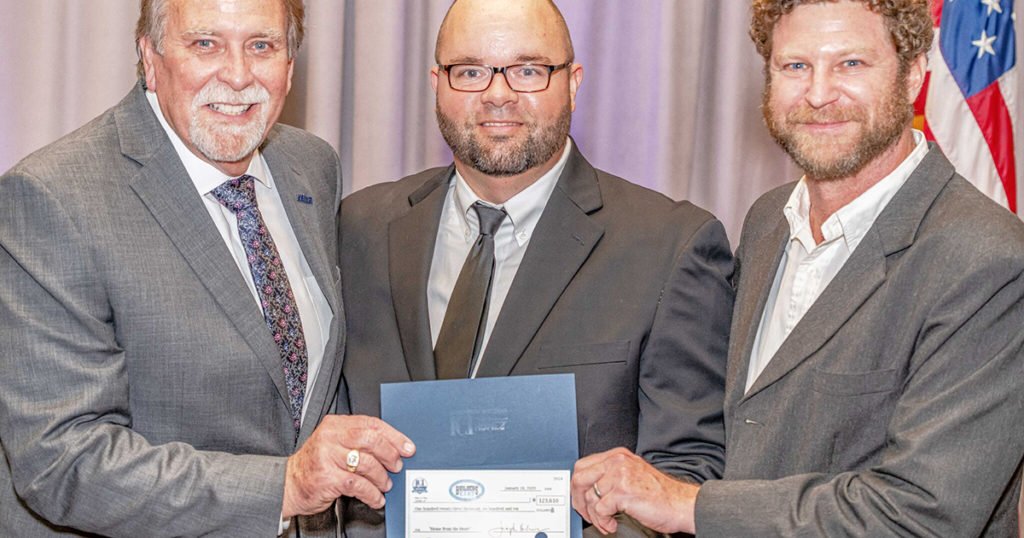 A Good Cause: “Home from the Heart” Project Delivers $123,000 Donation to Builders Care - nefba check