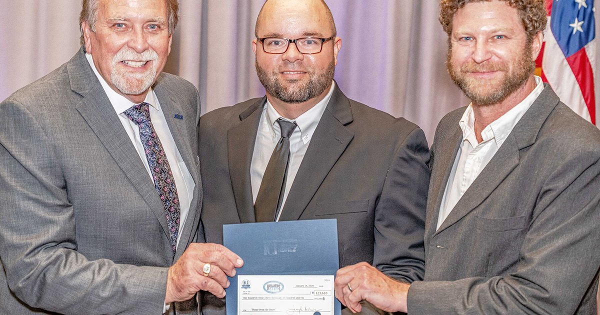 A Good Cause: “Home from the Heart” Project Delivers $123,000 Donation to Builders Care - nefba check