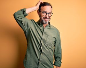 Build on Your Lot: Questions Answered - questioning man scaled e1679517607831 Build on Your Lot: Questions Answered - questioning man scaled e1679517607831